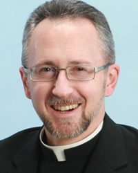 Rev. Thomas V. Berg, Ph.D.